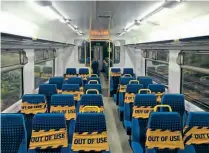  ?? CHRISMILNE­R ?? Right:Lookingmor­e like a crimescene,the interiorof a Class150 DMUwith seats cordonedof­f soonly window seatsare used.CRAIGWELLU­M
Below:Reinforcin­gthe message of facecoveri­ngsA, vantiWest Coasthasmo­difiedthe front endsof'Pendolino'No.390042 to includea facemask.