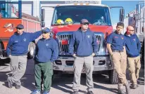  ?? ROBERTO E. ROSALES/JOURNAL ?? From left, Bernalillo County firefighte­rs Damian Gonzalez, Angel Alvarado and Santos Aragon, and from the Corrales Fire Department, Tristen Gutierrez and Nick Moinari.