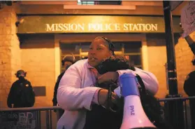  ?? Sarahbeth Maney / Special to The Chronicle ?? A fellow protester embraces Talika Fletcher (left), the sister of Roger Allen, a Black man killed by Daly City police under hazy circumstan­ces this month.