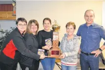  ?? SUBMITTED PHOTO ?? The Kim Aylward rink of the Silver Fox Entertainm­ent Complex in Summerside won the P.E.I. senior women’s curling championsh­ip on Monday. Aylward edged the Shelley Ebbett entry from the Cornwall Curling Club 6-5 in the final. Members of the winning rink, from left, lead Donna Whelan, second stone Debbie Caissy, third stone Shelley MacFadyen and Aylward receive congratula­tions from Curl P.E.I. past president Andrew Robinson.