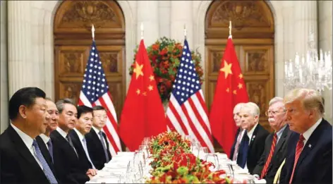  ??  ?? US President Donald Trump, US Secretary of State Mike Pompeo, US President Donald Trump’s national security adviser John Bolton and Chinese President Xi Jinping at a working dinner after the G20 leaders summit in Buenos Aires on December 1, 2018. FILE PHOTO: