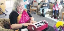  ?? PHOTO: SAMUEL WHITE ?? Dotting the i’s . . . ‘‘That Blind Woman’’ Julie Woods types a Holmdene resident’s name in Braille as part of a new project to write one million names in the language used by the visually impaired.