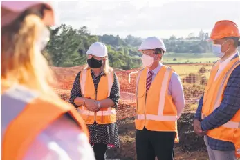  ?? ?? Angie and Minister Wood at the Tākitimu North Link site. PHOTO: Supplied.