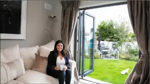  ??  ?? TV3 personalit­y Lisa Cannon who is extremely happy with her new Weathergla­ze bifold door.
