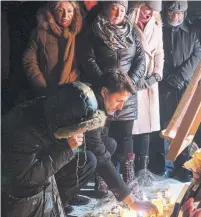  ?? ADRIAN WYLD THE CANADIAN PRESS ?? Prime Minister Justin Trudeau, shown Thursday at a candle-light vigil in Ottawa, said it was too soon to discuss Canada’s response.