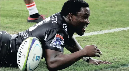  ??  ?? HAT-TRICK HERO: Lwazi Mvovo crosses the tryline for one of his three tries for the Sharks against the Sunwolves in Singapore yesterday. For the Sharks
