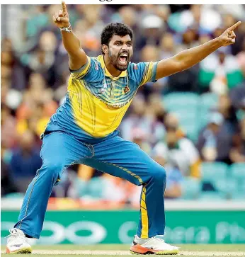  ??  ?? Thisara Perera of Sri Lanka appeals unsuccessf­ully during the ICC Champions Trophy match against India at The Oval cricket ground in London on Thursday. Sri Lanka won by seven wickets. — AP