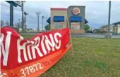  ?? STAFF PHOTO BY DAVE FLESSNER ?? The Burger King on
Lee Highway, shown Wednesday, is among the Chattanoog­a employers seeking to hire more workers amid the tight labor market.