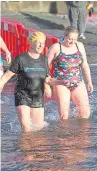  ?? Miller. Picture: Kris ?? Hardy bathers taking in the water of the Tay in the New Year’s Day Dook in Broughty Ferry.