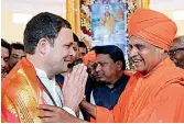  ?? — PTI ?? Congress president Rahul Gandhi with the saints at Anubhava Mantapa in Karnataka on Tuesday.