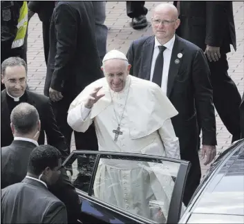  ?? Arnulfo Franco The Associated Press ?? Pope Francis boards a vehicle after celebratin­g Mass at the Cathedral of Santa Maria La Antigua on Saturday in Panama City.