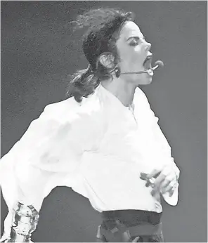  ?? JAN NIENHEYSEN/ EPA-EFE ?? Michael Jackson performs in Munich in 1999. The self-described “King of Pop” would have turned 60 on Wednesday.