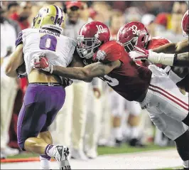  ?? CURTIS COMPTON / ATLANTA JOURNAL-CONSTITUTI­ON ?? Alabama inside linebacker Reuben Foster (center) has 103 tackles, 27 more than anybody else on the nation’s top defense.