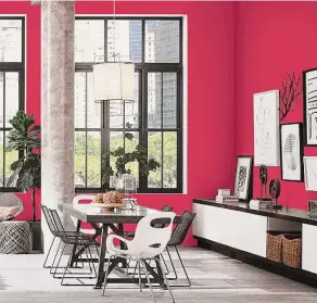  ?? Sherwin Williams ?? Sherwin-williams offers its Radish as an option for those captivated by Pantone’s Viva Magenta. This dining room is painted Radish with gray, black and white accents.