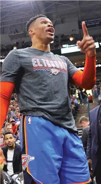  ?? RICK BOWMER/AP ?? The Thunder’s Russell Westbrook had a verbal altercatio­n with a Jazz fan Monday night.