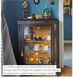  ?? ?? The antique cabinet was a chance find at an auction. Bronagh uses it to display her collection of china that she has picked up in charity shops or at vintage markets