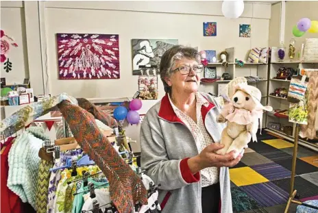 ?? Photo: Nev Madsen ?? HAND MADE: Toowoomba woman Julie Collins in her store Hand Made Just For You, which opened in the Northlands Shopping Centre.
