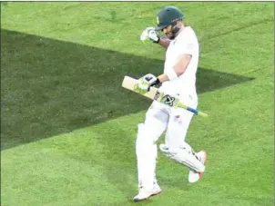  ?? PETER PARKS/AFP ?? South Africa captain Faf du Plessis celebrates his century during the first innings of the third Test against Australia at the Adelaide Oval in Adelaide yesterday.