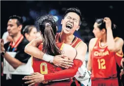  ?? FIBA ?? China's Sijing Huang celebrates after a 76-71 win over Canada at the women's World Cup in Spain on Saturday. China advanced to the fifth-place game.