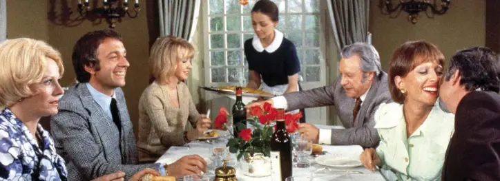  ??  ?? WAITING GAME: A scene from Luis Bunuel’s film ‘The Discreet Charm of the Bourgeoisi­e’, where six friends continuall­y meet for dinner but never get their hands on the food