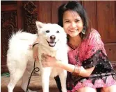  ?? DIAN WAHYUNIANT­O FOR JAWA POS ?? BERIZIN: Retno Tan bersama sang ayah memelihara dan mengembang­biakkan anjing kintamani.