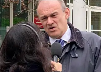  ?? Picture: Phil Creighton ?? ON THE SPOT: Sir Ed Davey being interviewe­d outside the Royal Berkshire Hospital