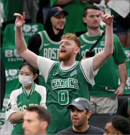  ?? MATT STONE / BOSTON HERALD ?? A Celtics fan screams out during warmups before Game 6 of the NBA Finals at the TD Garden on Thursday night.