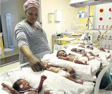  ?? Picture: Masi Losi ?? Prudence Ndlangisa was expecting triplets, but then baby No 4 and 5 made their appearance.