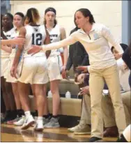  ?? PETE BANNAN — MEDIANEWS GROUP ?? Westtown coach Carrie Timmins directs her players during Tuesday’s 2--point win over Peddie.