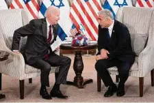  ?? Evan Vucci/Associated Press ?? Biden and Israeli Prime Minister Yair Lapid met Thursday in Jerusalem. Biden holds out hope for diplomacy with Iran; Lapid says threat of force may be the only answer.