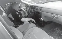  ?? Video screenshot provided by Aurora Police Department ?? Video shows police responding to Aurora Officer Nate Meier, who was found passed out drunk in his department car in the middle of a busy street on March 29, 2019, while on duty.