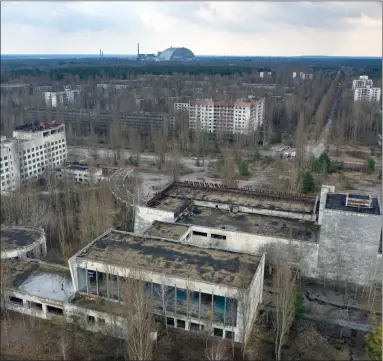  ?? Picture: AP Photo/efrem Lukatsky ?? A view of the ghost town of Pripyat – the vast and empty Chernobyl Exclusion Zone around the site of the world’s worst nuclear accident is a baleful monument to human mistakes