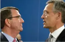  ?? VIRGINIA MAYO/THE ASSOCIATED PRESS ?? NATO secretary general Jens Stoltenber­g, right, speaks with U.S. Secretary of Defense Ash Carter.