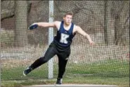  ?? DENNIS KRUMANOCKE­R - FOR DIGITAL FIRST MEDIA ?? Kutztown’s Connor O’Neil prepares to unleash a winning throw in the discus.