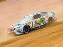  ?? CHRIS GRAYTHEN/GETTY ?? Kyle Busch drives during first practice for the NASCAR Cup Series Food City Dirt Race on Friday at Bristol Motor Speedway in Bristol, Tennessee.