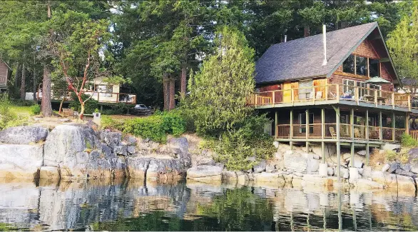  ?? PHOTOS: A.R. BAILIE ?? A room for two with a deck, barbecue and marina view can be had for less than $130 at the laid-back Pender Harbour Resort & Marina on the water’s edge.