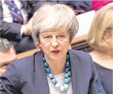  ?? PHOTO: GETTY ?? Dramatic scenes: Prime Minister Theresa May makes her statement in the Commons yesterday.