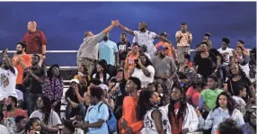  ??  ?? Ridgeway fans during the game against Memphis University School at Memphis University School. JUSTIN FORD/FOR THE COMMERCIAL APPEAL