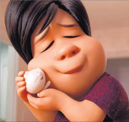  ?? Disney-Pixar ?? WITH THE animated “Bao,” above, screening before “The Incredible­s 2,” Domee Shi became the first female to direct a Pixar short.