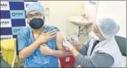  ?? SANJEEV VERMA/HT ?? A doctor gets vaccinated in New Delhi on January 18.