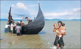  ?? REUTERS ?? Rohingya Muslims flee Myanmar and arrive in Bangladesh through the Bay of Bengal on Friday.