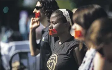  ?? Kent Nishimura Los Angeles Times ?? ANTIABORTI­ON activists wait outside the U.S. Supreme Court as decisions are announced last month in Washington. A protest planned for Saturday in Santa Monica is raising concerns about potential clashes.