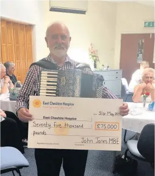  ??  ?? Accordion player John Jones showing the power of music at East Cheshire Hospice