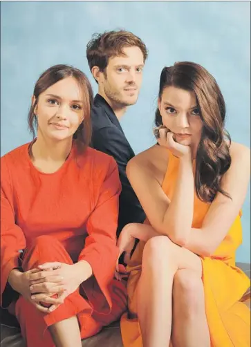  ?? Jay L. Clendenin Los Angeles Times ?? CORY FINLEY, center, with lead actresses Olivia Cooke, left, and Anya Taylor-Joy, wanted “Thoroughbr­eds,” his directoria­l debut, to look at some of the “core moral questions” around social class, privilege and wealth.