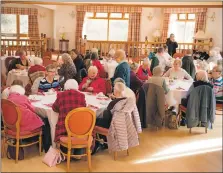  ?? ?? Care Lochaber provides events such as this where people can get together and enjoy a treat and company.