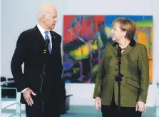  ?? Getty ?? Joe Biden and German Chancellor Angela Merkel in 2013. The US president-elect looks set to restore ties with Europe
