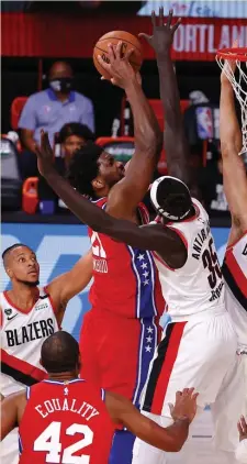  ?? Pool PHoto FIle ?? TROUBLE DOWN LOW: Joel Embiid goes up for a shot from close range, a place he likes to occupy..