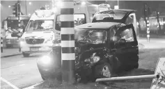  ??  ?? View of damaged car believed to have carried Manchester City’s Sergio Aguero after a road accident in Amsterdam, Netherland­s. — Reuters photo