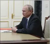  ?? MIKHAIL KLIMENTYEV — SPUTNIK, KREMLIN POOL PHOTO, FILE ?? Russian President Vladimir Putin chairs a meeting with members of the Security Council via a video conference at the Kremlin in Moscow, Russia.