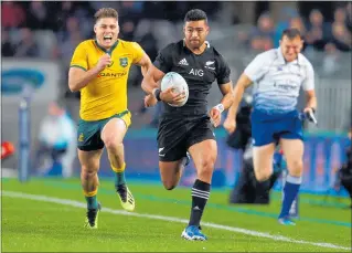  ?? PHOTO / GETTY IMAGES ?? Richie Mo'unga scores a try during The Rugby Championsh­ip and Bledisloe Cup test match between the All Blacks and the Wallabies.